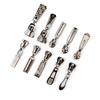 China Others Wholesale Customized Metal Zipper Slider Auto Lock Zipper Pullers for sale