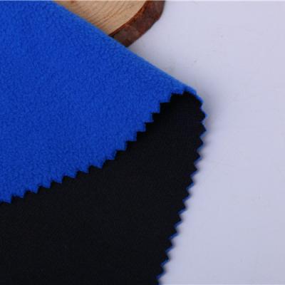 China High Quality 4 Way Anti-Static Stretch Soft Shell Brushed Knitted Solid Fleece Fabric For Garment for sale