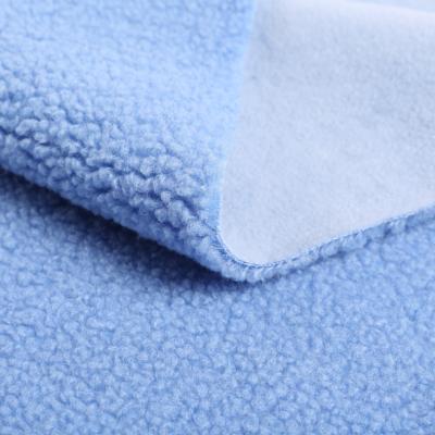 China Antistatic 100% Polyester Sherpa Fleece Fabric Teddy Accept Softshell Fleece Fabric For Jacket for sale