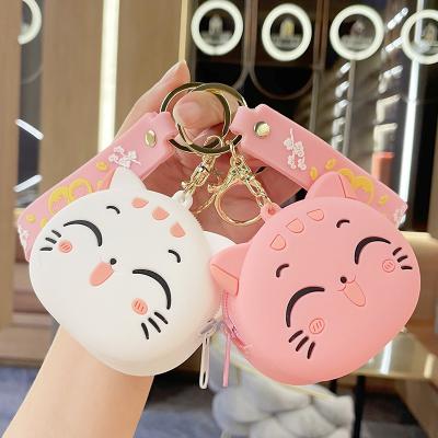 China Bag Car Pendant Accessories Wholesale Creative Cartoon Cat Silicone Coin Purse Keychain Cute Schoolbag Pendant Rubber Earphone Storage Key Chain for sale