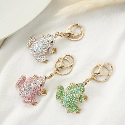 China Bag Car Pendant Accessories Hot Sale European And American Creative Fashion Hollow Frog Pendant Diamond Inlay Cute Animal Metal Keychain For Gift for sale