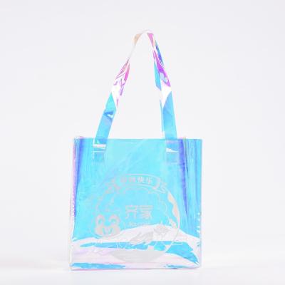 China Custom Laser Portable Holographic Iridescent Waterproof Jelly Handled PVC Shopping Bag Colorful Logo Gift Bag for sale