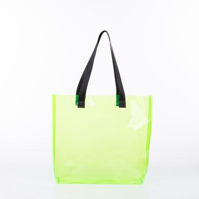 China Reusable Hot Sale Laser PVC Yellow Holographic Transparent Shopping Gift Bag for sale