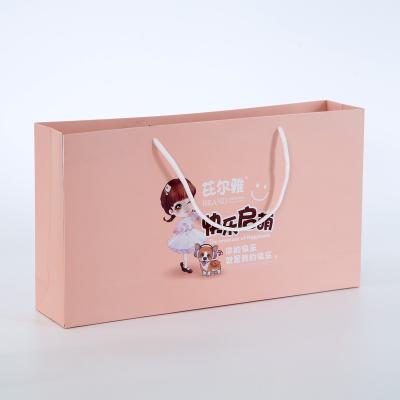 China Recyclable Custom Luxury Pink Art Paper Bag Gift Bag With Handles for sale