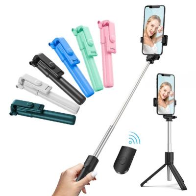 China Wholesale Fold Low Price Selfie Stick With Tripod Remote for sale