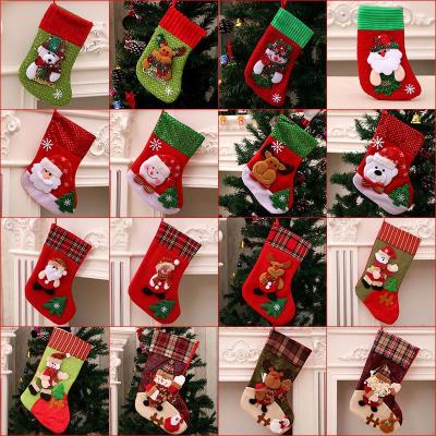 China Christmast ornament 2021 new arrived knit Christmas candy gift bags decoration clothes jars Santa Candy Bag Christmas Stocking for sale