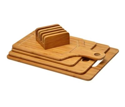 China Sustainable Natural Organic Bamboo Cutting Board And Bamboo Pizza Board With Standing Rack for sale