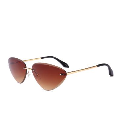 China Fashion Sunglasses 2021 Women Shape Oval Round Lens PC Cateye Sun Glasses Rimless Sunglasses Running Cheap Sun Glasses for sale