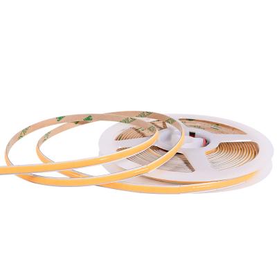 China 100M/PCS Without Welding COB LED Strip Ribbon Light DC12V 320leds 8mm IP20 9W/M Common Infinitely Long Dotless Flexible COB Strip Light for sale