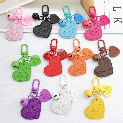 China Newest Fashion Wholesale Heart Shape Key Chain Metal Bell Colorful Acrylic Keychain Strap For Wallet Accessories for sale