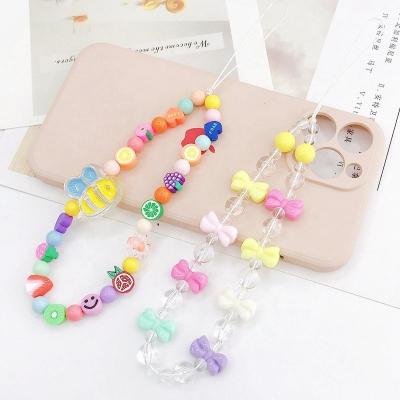 China Fashion New Style Colorful Pearl Mobile Phone Strap Fruit Bowknot Mobile Phone Case Chain For Women Girl for sale