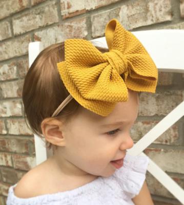 China Soft Hot Selling Baby Hair Accessories Various Colors Bow Bow Headbands Nylon Seamless Baby Knot Headband Big For Kids for sale