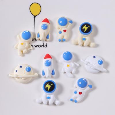 China No New Designer Astronaut Cabochon Resin Charms Outer Space Decorative Accessories DIY Awesome Cell Phone Case for sale