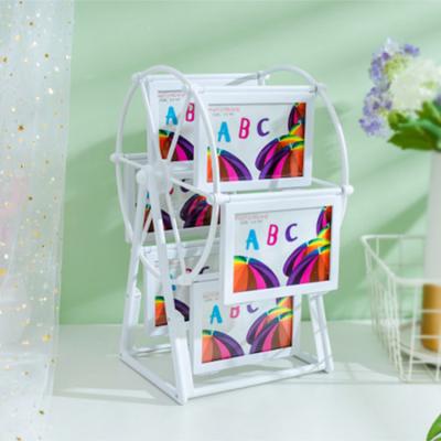 China Beautiful Photo Frame Ferris Wheel Rotating Photo Frame Cube Home Decoration Photo Frame Luxury for sale