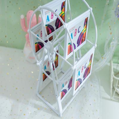 China 5 Inch Ferris Wheel Photo Frame Windmill Multifunctional Children's Artwork Photo Frame Glass Frame Fun for sale