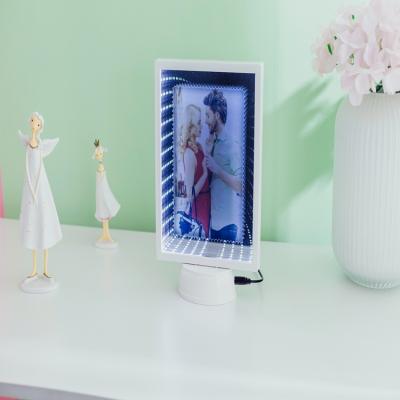 China Creative magic mirror ccosmeti rectangular mirror led lamp photo multifunctional picture frames for sale