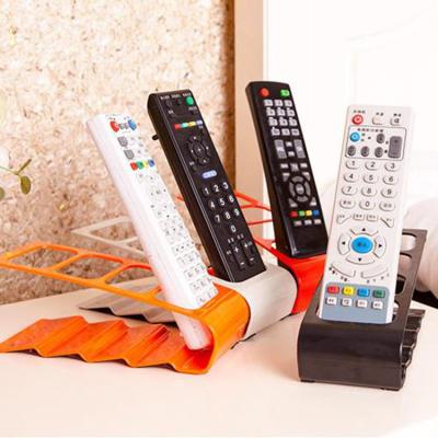 China Creative Four-compartment Storage TV Rack Remote Control Remote Control Rack for sale