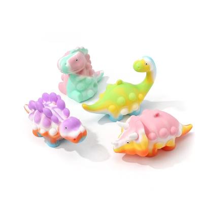 China New silicone dinosaur shape fidgety people ball pinching music rat extermination pioneer toy pinching ball for kids for sale