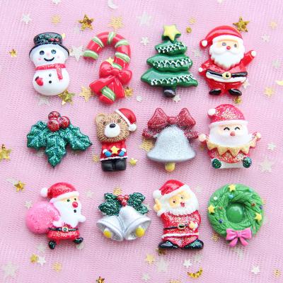 China 100Pcs/Bag Europe Christmas Tree Santa Snowman Flatback Resin Cabochon For Hair Bow Centerpiece DIY Home Decoration Accessories for sale