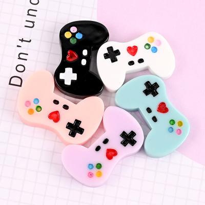 China 100Pcs/Bag Europe Cartoon Gamepad Resin Flat Back Cabochon For Hair Bow Center Phone Shell Decoration Accessories for sale