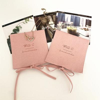 China Luxury Soft Custom Personalized Pink Suede Microfiber Velvet Flap Jewelery Bags Packaging Pouch With Bow Ribbon Insert For Boxes Sets for sale