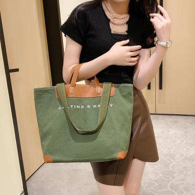 China YIMYIK Retro Vintage Women's Casual Canvas Splicing PU Letter Print Shoulder Bag Tote Bags Custom Logo Lady for sale