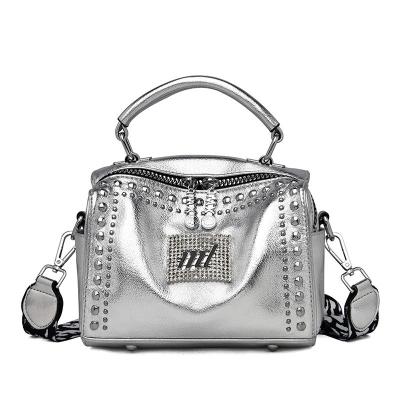 China 2022 fashion Trebding brand women boston shoulder bags design ladies big new rivet shiny cross - body bags with wild strap for sale