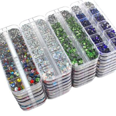 China Hot Sale Flatback Set 1200Pcs 12 Grid Crystal Rhinestones Hotfix SS6-SS30 New Boxes Mixed Size Glitter Glass Rhinestone Iron-on Gem Rhinestones for sale