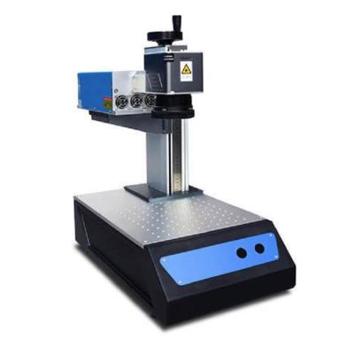 China Automated Loading High Speedy Laser UV 5W Conveyor Flying UV Laser Marking Date Code Machine For Engraving Perfumes Glass Plastic for sale