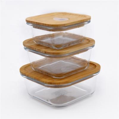 China Sustainable 2020 New Heat Resistant Glass Food Bowls Container With Bamboo Locking Lid for sale