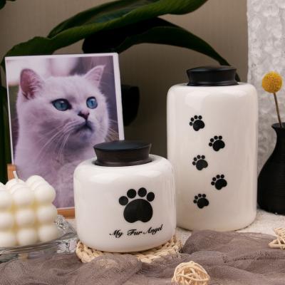 China Wholesale Ceramic Pet Urn 800ml Pet Paw Cremation Ash Urn Cat Dog Viable Ceramic Animal Memorial Pet Urn For Ash Keepsake for sale