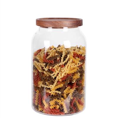 China Wholesale Freshness Preservation Borosilicate Glass Airtight Jars Tall Tall With Wooden Lids for sale