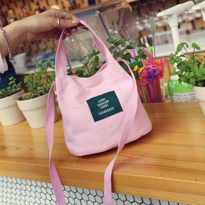 China Japanese minimalist mori academic style letter canvas bag slung shoulder bag handbag small bucket bag for sale