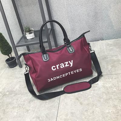 China Printed handbags, luggage bags, large-capacity men's and women's travel bags, fashion sports fitness bags for sale