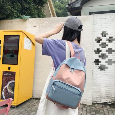 China Ins fashion sports new ins color nameplate backpacks student bags handbags for sale