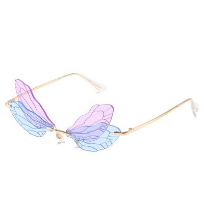 China Hot Selling Party Sunglasses Designer Dragonfly Wings Rimless Eyewear Running Sun Glasses Fashion Eyewear For Women for sale