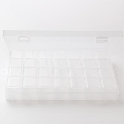 China Portable ring storage is convenient and portable 28 grid plastic jewelry storage box optional without words for sale