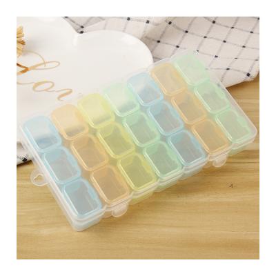 China Eco-friendly Weekly Pill Organizer Factory Wholesale High Quality One Week Medicine Plastic Alphanumeric Portable Storage Pill Box for sale