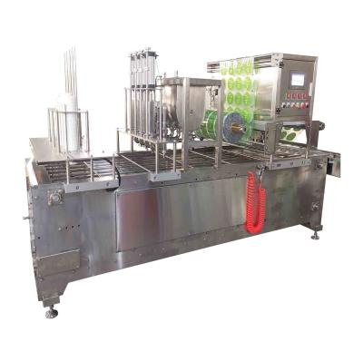 China Automatische Tray-Füllmaschine Versiegelungsmaschine für Puree Hoosh zu verkaufen