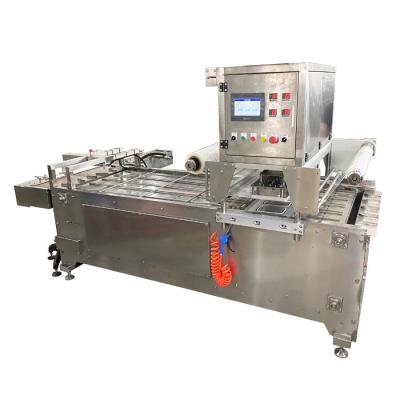 China PLC-besturingssysteem Verpakkingsmachine voor voedselbakken 25-45 bakken/min Te koop