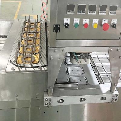 China PLC-Steuerung Automatische Tray Versiegelungsmaschine Edelstahl Verpackungsmaschine zu verkaufen