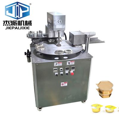 China Automatic Rotary Tray Sealing Machine for Customized Nuts Snacks Plastic Food Trays for sale