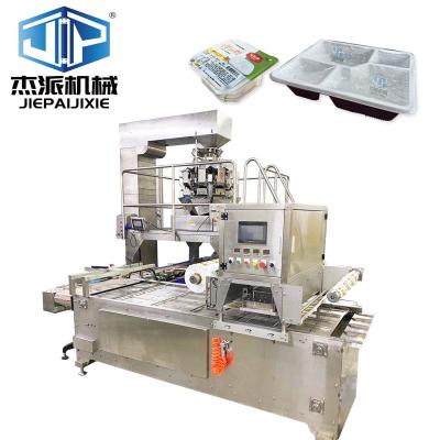 China Efficiently Sealing Fruits Silver Automatic Tray Sealing Machine With Vacuum System for sale