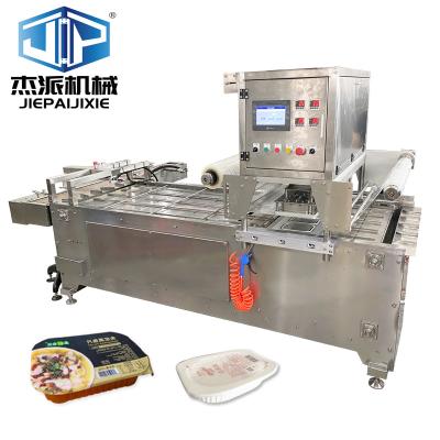 China PP / Aluminum Foil Tray Packaging Automatic Sealing Machine Advanced Technology For Food Distribution Center for sale