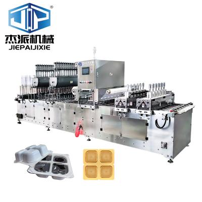 China Equipo de llenado de bandejas de volumen de 50 ml a 200 ml con sistema de control PLC avanzado y llenado personalizable en venta