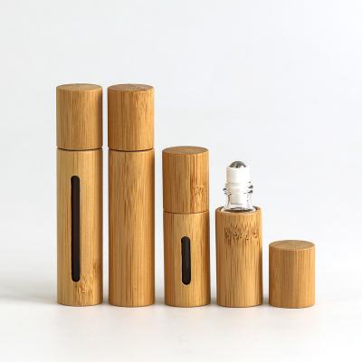 China Environmental Friendly High Quality Bamboo Glass Roller Lid Perfume Roller 5Ml Bamboo Bottle 5Ml, 10Ml Glass Roller Bottles With Bamboo Lid for sale