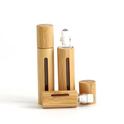 China Environmental friendly factory direct customized essential oil roller bottle bamboo lid bamboo perfume bottle,bamboo roll on bottle for sale