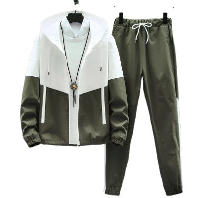 China Mens QUICK DRY Tracksuit Casual Hoodies Spring New Male Jackets+Pants Two Piece Sets for sale