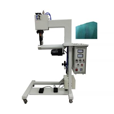 China Non woven fabric sealing surgical gown wholesale promotional ultrasonic sleeve sealing sewing machine for surgical gown for sale