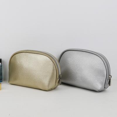 China Custom Logo Elegant Women Makeup Bag Solid Color PU Waterproof Cosmetic Bags Large Capacity for sale